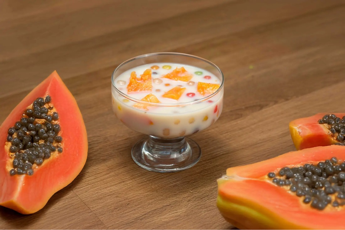 Papaya sago dessert with chewy sago pearls and Yeo's Soy Drink in a chilled bowl